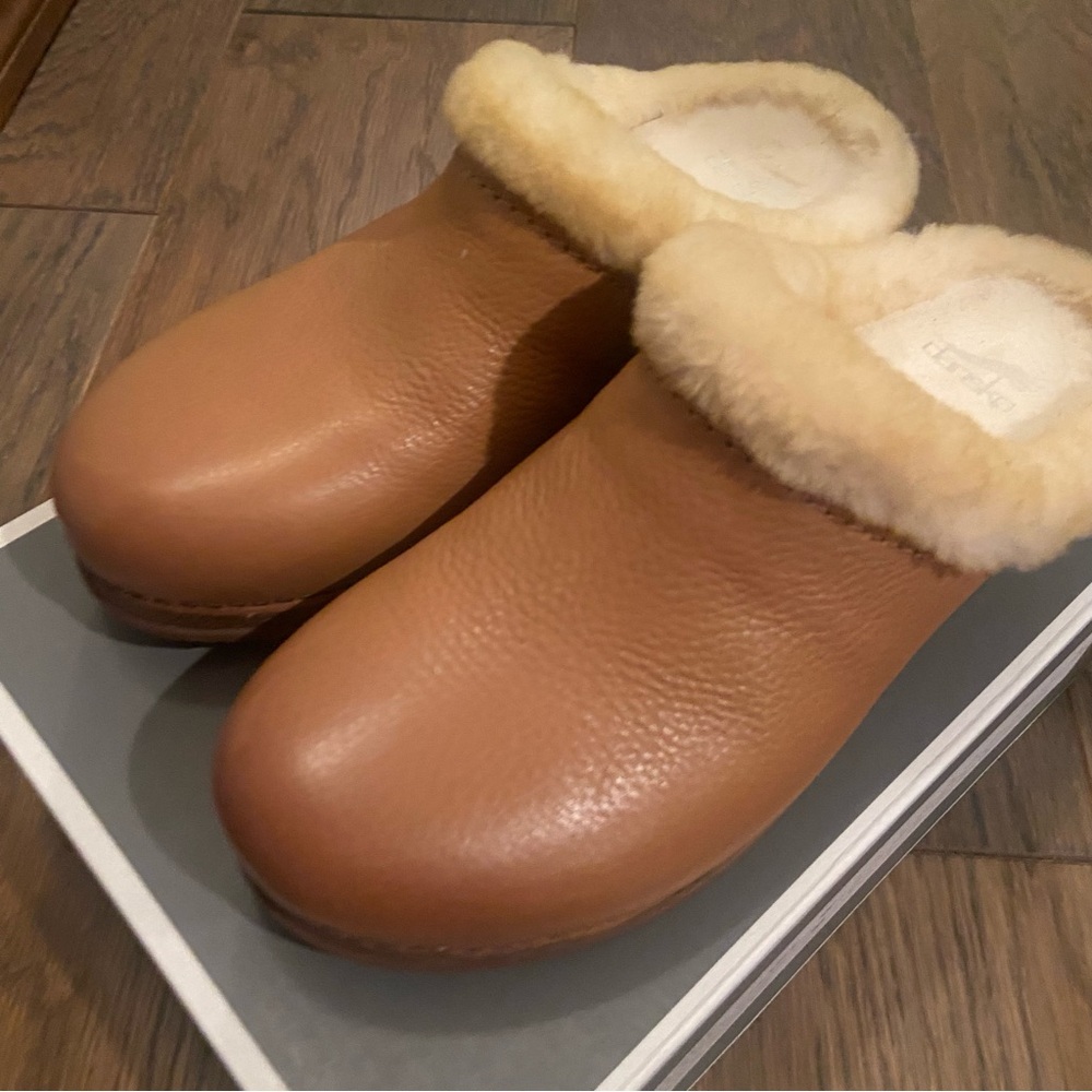 Dansko Magda Slip On Clog
New, in box. 
Waxy Milled Tan 
Size 39 (8.5-9)